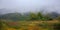 Rural area in mountains. misty september morning