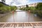 Rural bridge made of wood over river Vilcanota