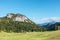 Rural chalet under amazing limestone rock hill