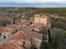 Rural cityscape with similar buildings and fields of Calatanazor, Teruel, Spain