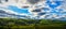 Rural Cornish lanscape, Cornwall, dramatic and dynamic sunny lanscape with green hills and cloudy blue sky