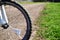 Rural dirt road amid cycling wheel summer holiday