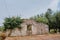Rural dry stone house in olive tree orchand in Europe