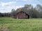 Rural Farmhouse Barn in a Countryside Pasture
