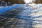 Rural frozen slippery asphalt road