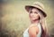 Rural girl in a straw hat