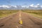 rural highway across Nebraska Sandhills on a sunny late summer day