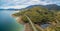 Rural highway along Tumut River coastline.