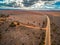 Rural highway bend in Australian outback.