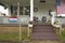 A rural house with American flag