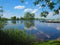 Rural idyllic landscape with the Eider river and the small marina of bargen in Schleswig-Holstein