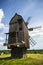 Rural idyllic landscape with wooden windmill