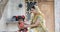 Rural Indian woman with daughter holding piggy bank