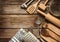 Rural kitchen utensils on vintage planked wood table