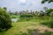 Rural lakeside wooden cabins in sunny summer