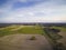 Rural landscape, arable fields and meadows seen from the air, photos from the drone
