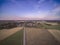 Rural landscape, arable fields and meadows seen from the air, photos from the drone