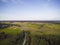 Rural landscape, arable fields and meadows seen from the air, photos from the drone