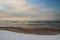 Rural landscape. Beautiful winter over snowy Baltic beach