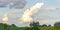 The rural landscape and cumulonimbus formation clouds in the sky of South America