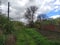 Rural landscape: electric pole and fence