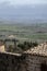 Rural landscape with farmhouse and green meadows in Tuscany