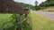 Rural Landscape with Grass, Fence and Road in Countryside