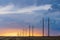 Rural landscape with high-voltage line on sunset