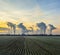 Rural landscape with an industry plant beyond