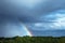 Rural landscape with rainbow