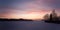 Rural landscape, sunset over snowy field panorama, with dreamy colored sky