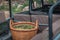 Rural large wicker basket with fresh olives standing in the back of a farmer`s car