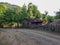 Rural mud house with gable roof.