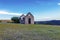 Rural Old Derelect Farm Building on Dry Winter Landscape