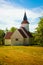 Rural old fashioned church during sunny weather