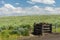 Rural prairie with rock fence post