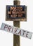 Rural Private No Trespassing Sign on Wood Post