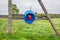 Rural public telephone on a green field