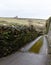 Rural road along the high walls