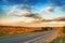 Rural road and blue sky with clouds