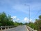 Rural road with many trees in An Giang, Vietnam