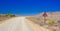 Rural roadway on background of bright blue sky