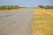 Rural roadway on background of the sky