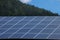 Rural scene of an alpine barn with photovoltaic panels