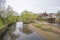 Rural scene down english river with bridge