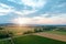 Rural scene, sunset in the meadow, summer evening