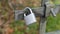 Rural security fences, wire & chain padlocks close up