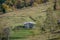 Rural shed on a green meadow