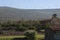 Rural spanish landscape with wind turbines on the hills