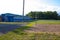 Rural stadium with blue stands. Sports ground